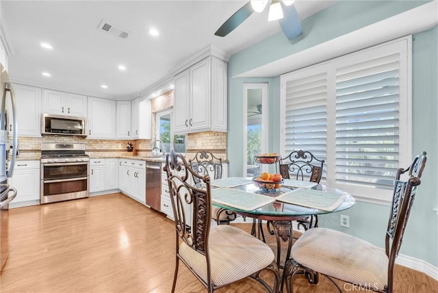 1160 Baseline Rd, La Verne, CA 91750 - dining area with light wood-style flooring, a ceiling fan, and recessed lighting