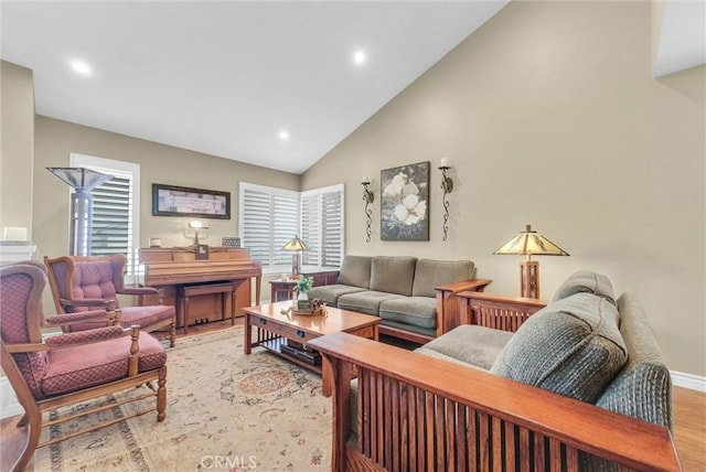 1160 Baseline Rd, La Verne, CA 91750 - living room with light wood-style flooring, recessed lighting, high vaulted ceiling, and healthy amount of natural light