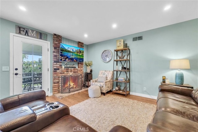 1160 Baseline Rd, La Verne, CA 91750 - living room with wood finished floors, a fireplace, and recessed lighting