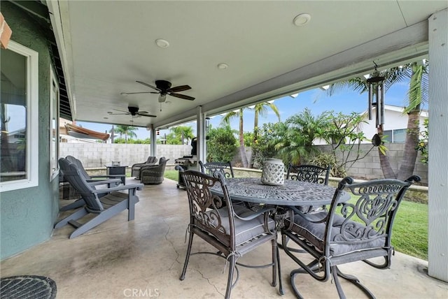 1160 Baseline Rd, La Verne, CA 91750 - fenced backyard with outdoor dining area, a patio area, and a ceiling fan