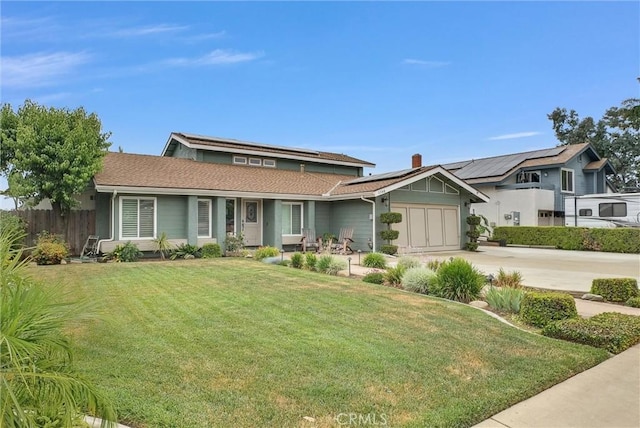 1160 Baseline Rd, La Verne, CA 91750 - view of front facade with concrete driveway, roof mounted solar panels, and an attached garage