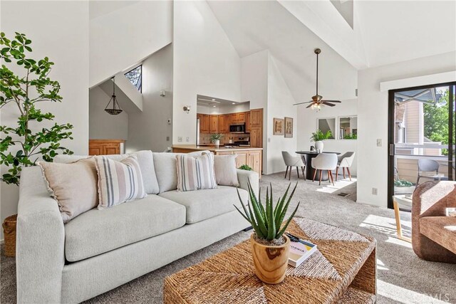 777 Chorro St Unit 3, San Luis Obispo, CA 93401 - living area featuring ceiling fan, light colored carpet, and high vaulted ceiling