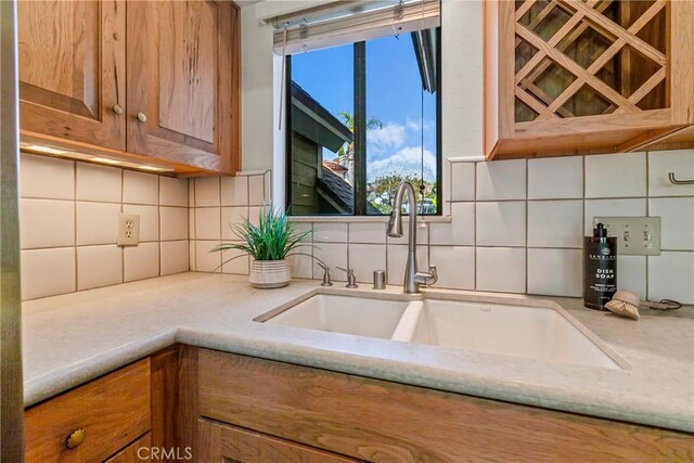 777 Chorro St Unit 3, San Luis Obispo, CA 93401 - kitchen with brown cabinets and backsplash