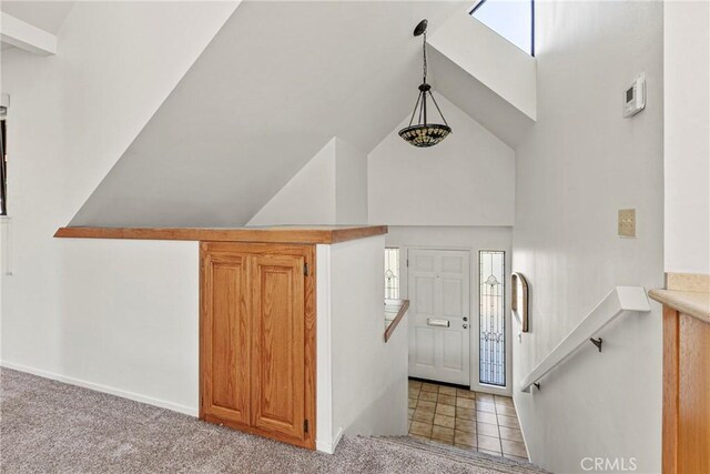 777 Chorro St Unit 3, San Luis Obispo, CA 93401 - foyer entrance featuring lofted ceiling, carpet, and healthy amount of natural light