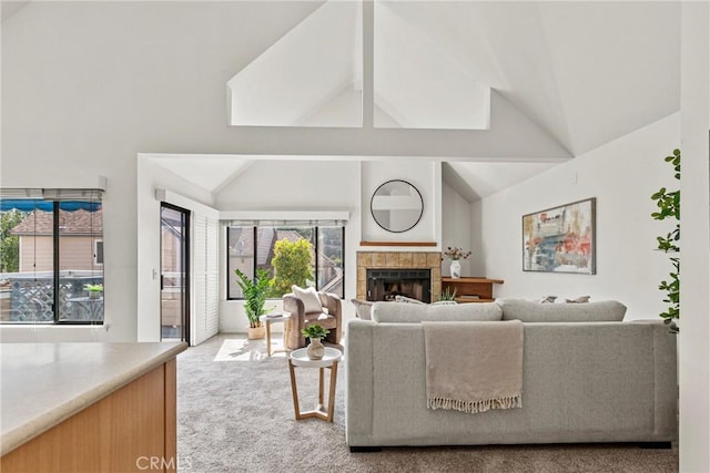 777 Chorro St Unit 3, San Luis Obispo, CA 93401 - carpeted living area featuring vaulted ceiling and a tiled fireplace