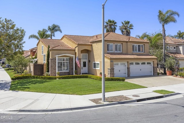 2561 Upper Bay Dr, Oxnard, CA 93036 - view of front of property with a garage, stucco siding, driveway, and a tile roof