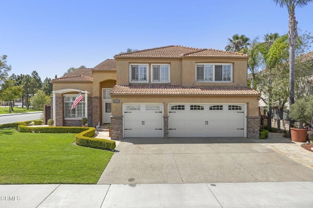 2561 Upper Bay Dr, Oxnard, CA 93036 - mediterranean / spanish home featuring an attached garage, stone siding, concrete driveway, a front yard, and stucco siding