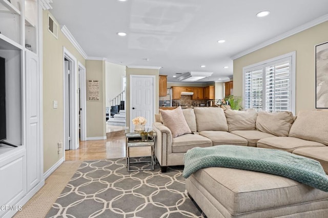2561 Upper Bay Dr, Oxnard, CA 93036 - living area with recessed lighting, crown molding, and stairway