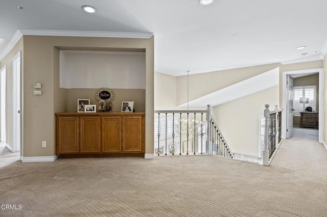 2561 Upper Bay Dr, Oxnard, CA 93036 - hall featuring light colored carpet, an upstairs landing, ornamental molding, and recessed lighting
