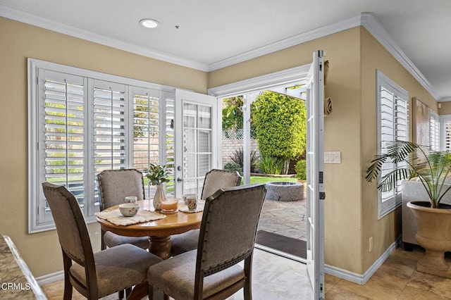 2561 Upper Bay Dr, Oxnard, CA 93036 - dining area featuring healthy amount of natural light and crown molding