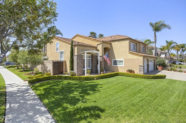2561 Upper Bay Dr, Oxnard, CA 93036 - view of front of house featuring concrete driveway, stucco siding, stone siding, an attached garage, and a tile roof
