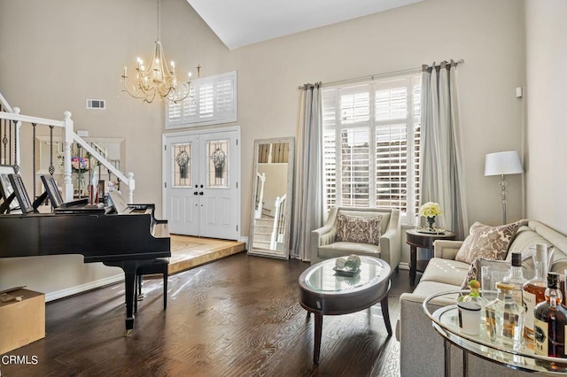 2561 Upper Bay Dr, Oxnard, CA 93036 - living area featuring stairway, wood finished floors, a chandelier, and a towering ceiling
