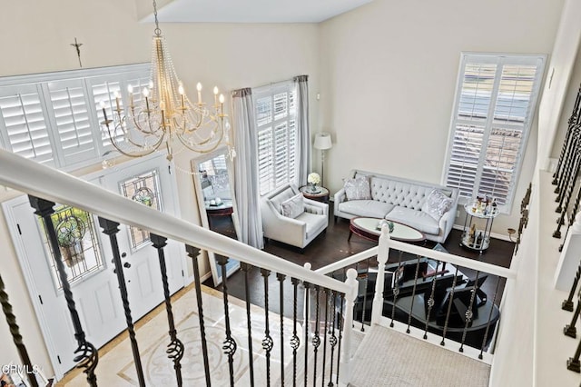 2561 Upper Bay Dr, Oxnard, CA 93036 - living area with stairway and a chandelier