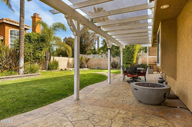 2561 Upper Bay Dr, Oxnard, CA 93036 - fenced backyard with a patio area, a pergola, and outdoor dining space