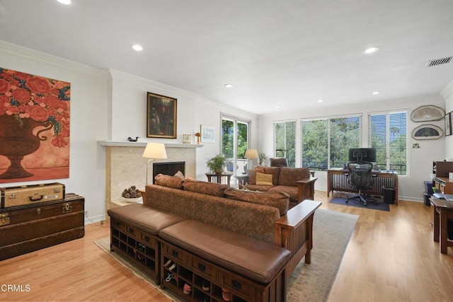 630 S Orange Grove Blvd Unit 5, Pasadena, CA 91105 - living area with a desk, crown molding, light wood-style flooring, a fireplace, and recessed lighting