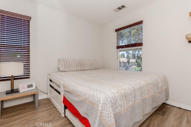13015 New Hvn, Riverside, CA 92503 - bedroom featuring wood finished floors and baseboards