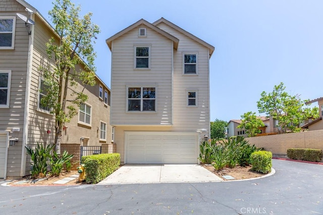 13015 New Hvn, Riverside, CA 92503 - view of front facade with a garage and concrete driveway