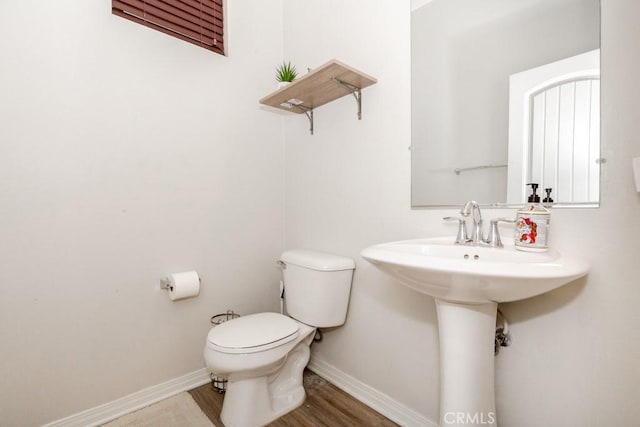 13015 New Hvn, Riverside, CA 92503 - half bath featuring toilet and wood finished floors