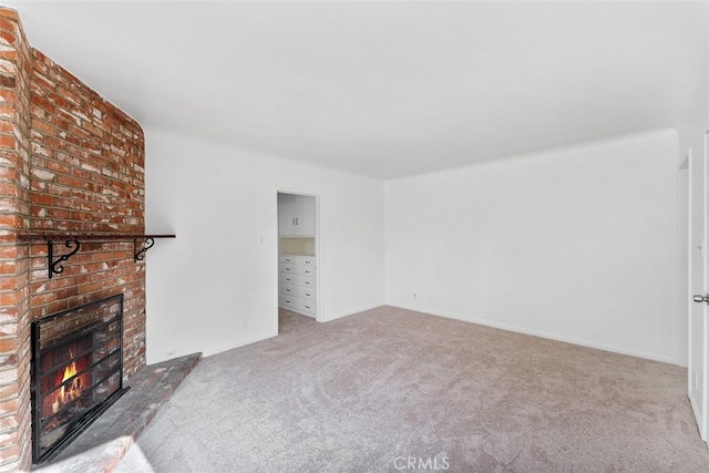 11749 Clarkman St, Santa Fe Springs, CA 90670 - unfurnished living room featuring carpet floors and a brick fireplace