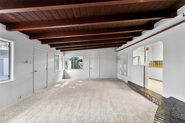 11749 Clarkman St, Santa Fe Springs, CA 90670 - empty room featuring carpet, plenty of natural light, and a wood ceiling with exposed beams