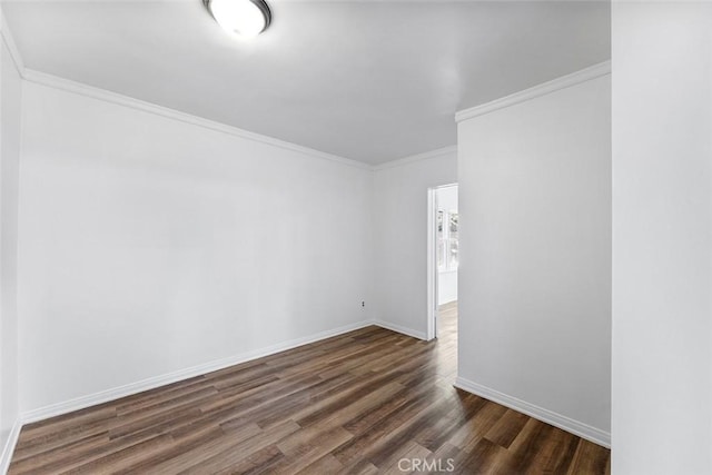 11749 Clarkman St, Santa Fe Springs, CA 90670 - empty room featuring dark wood-type flooring and ornamental molding