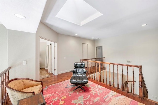 29411 Port Royal Way, Laguna Niguel, CA 92677 - living area featuring wood finished floors, a skylight, recessed lighting, and an upstairs landing
