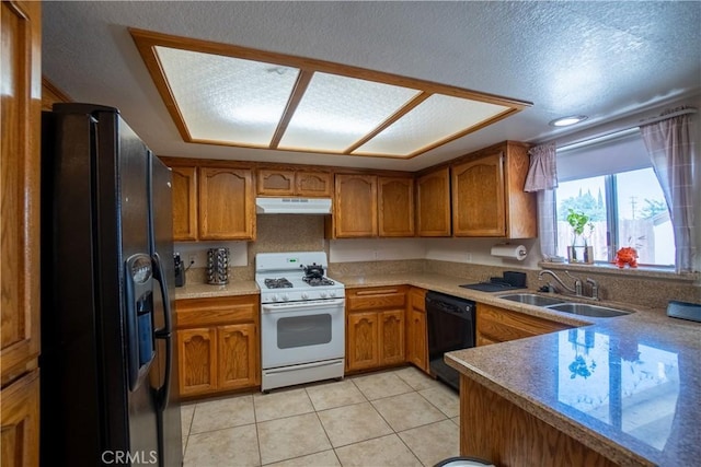 7681 Newhall Ave, Hesperia, CA 92345 - kitchen with black appliances, under cabinet range hood, brown cabinetry, and light tile patterned floors