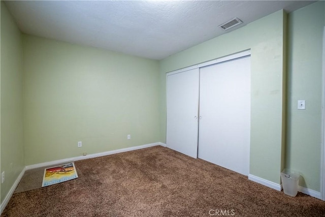 7681 Newhall Ave, Hesperia, CA 92345 - unfurnished bedroom with carpet and a closet