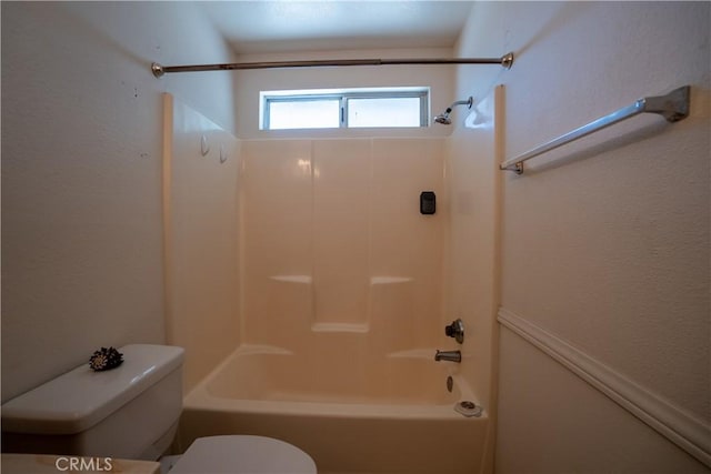 7681 Newhall Ave, Hesperia, CA 92345 - bathroom featuring toilet and bathing tub / shower combination
