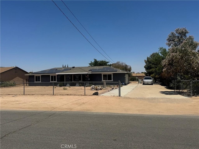 7681 Newhall Ave, Hesperia, CA 92345 - ranch-style home featuring roof mounted solar panels and concrete driveway