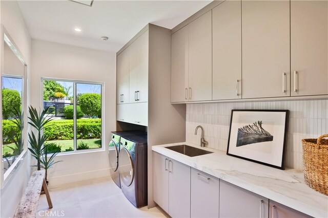 1257 Fetlock Way, Riverside, CA 92506 - washroom with cabinet space, washing machine and dryer, and recessed lighting