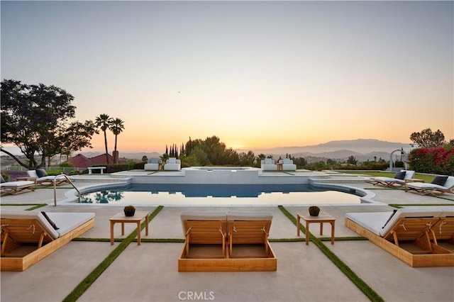 1257 Fetlock Way, Riverside, CA 92506 - outdoor pool featuring a patio and a mountain view
