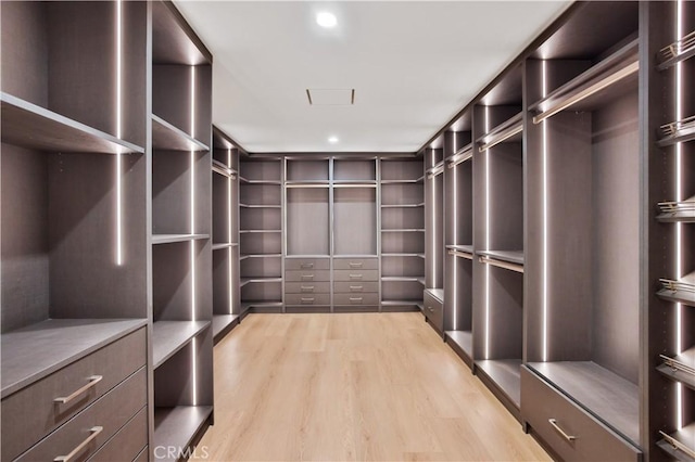 1257 Fetlock Way, Riverside, CA 92506 - spacious closet featuring wood finished floors