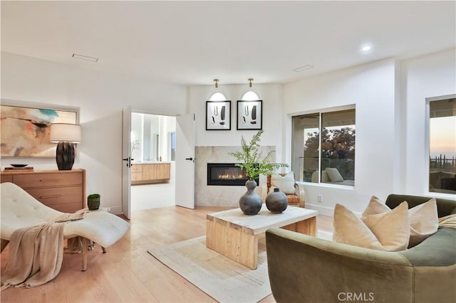 1257 Fetlock Way, Riverside, CA 92506 - living room with a fireplace, light wood-type flooring, and recessed lighting