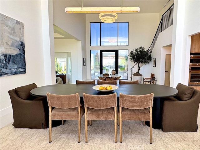 1257 Fetlock Way, Riverside, CA 92506 - dining space with a towering ceiling and baseboards