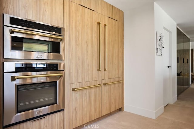 1257 Fetlock Way, Riverside, CA 92506 - kitchen with light brown cabinets, double oven, and modern cabinets