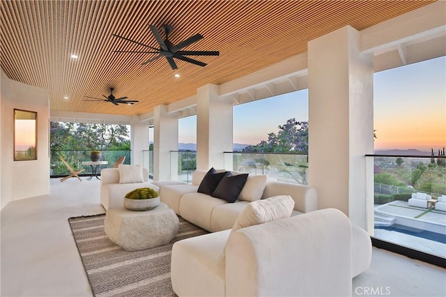1257 Fetlock Way, Riverside, CA 92506 - patio terrace at dusk featuring ceiling fan, an outdoor hangout area, and a balcony