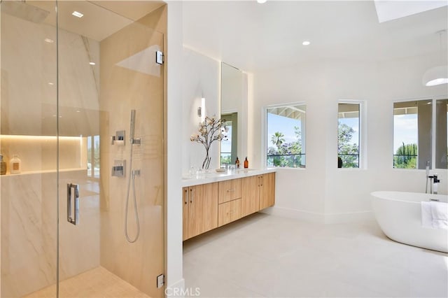 1257 Fetlock Way, Riverside, CA 92506 - full bathroom with a marble finish shower, vanity, a freestanding bath, and recessed lighting