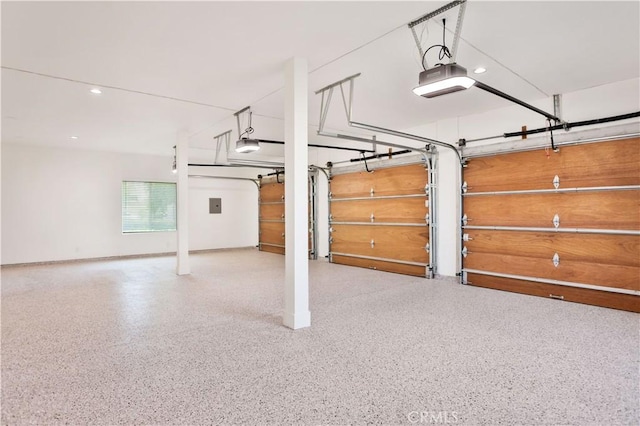 1257 Fetlock Way, Riverside, CA 92506 - garage featuring a garage door opener and recessed lighting
