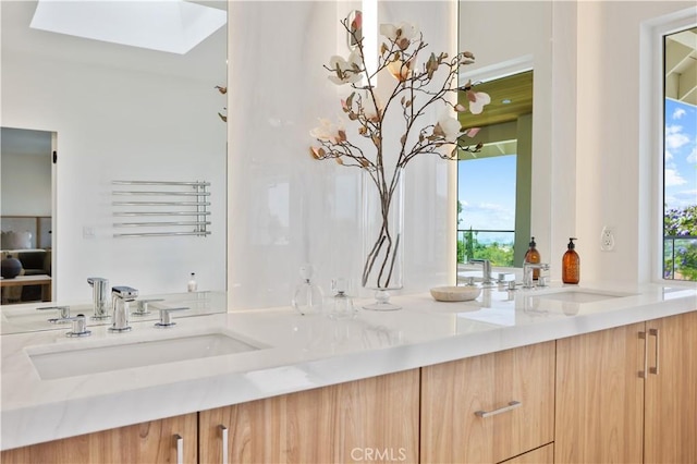 1257 Fetlock Way, Riverside, CA 92506 - bathroom featuring double vanity and plenty of natural light