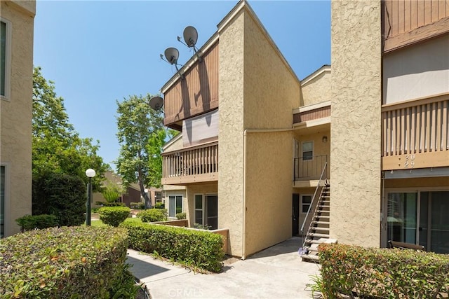 5910 Rancho Mission Rd Unit 27, San Diego, CA 92108 - view of building exterior with stairs