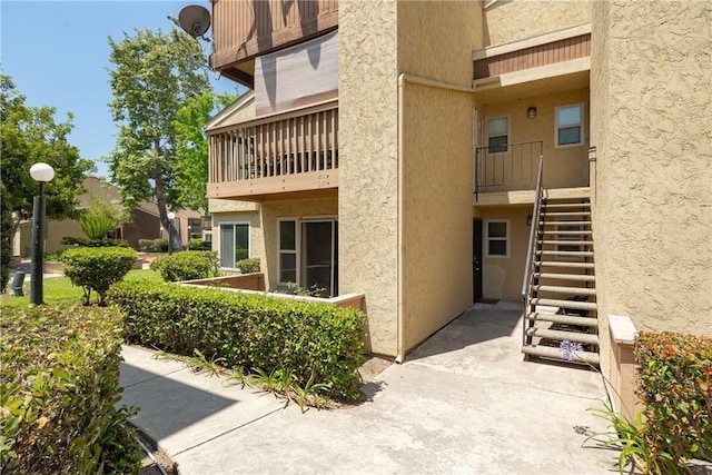 5910 Rancho Mission Rd Unit 27, San Diego, CA 92108 - view of property featuring stairway