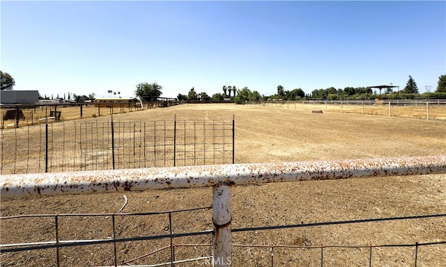 7519 Man O War St, Bakersfield, CA 93307 - view of yard featuring a view of countryside and an enclosed riding area