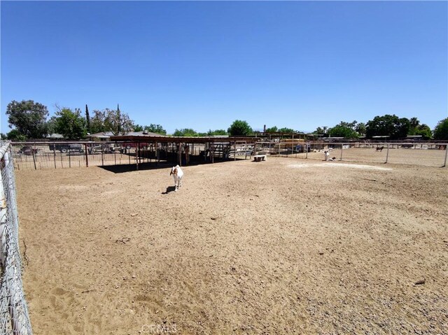 7519 Man O War St, Bakersfield, CA 93307 - view of yard with an exterior structure, an outdoor riding arena, and an outbuilding