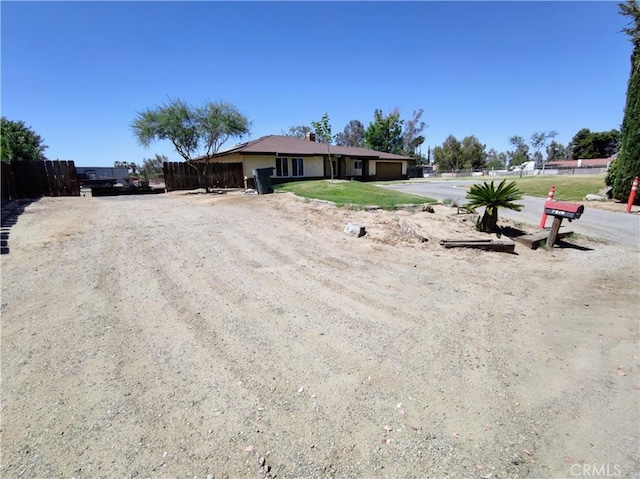7519 Man O War St, Bakersfield, CA 93307 - single story home featuring driveway and a garage