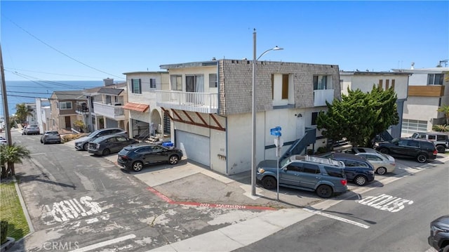 330 34th Pl, Manhattan Beach, CA 90266 - view of building exterior featuring an attached garage and a residential view