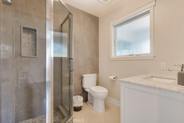 15460 La Maida St, Sherman Oaks, CA 91403 - full bath featuring a stall shower, vanity, tile patterned floors, and tile walls