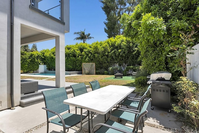15460 La Maida St, Sherman Oaks, CA 91403 - fenced backyard with a grill, a patio, and outdoor dining area