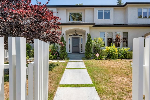 15460 La Maida St, Sherman Oaks, CA 91403 - view of front of home with a front lawn and stucco siding