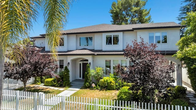 15460 La Maida St, Sherman Oaks, CA 91403 - view of front of home with stucco siding and a fenced front yard